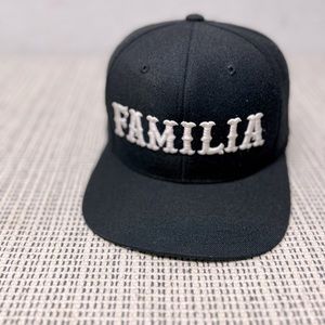 The classics “familia” embroidered adjustable hat black white One size snap back